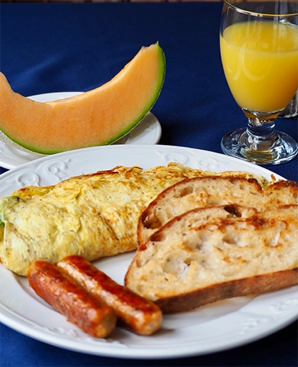 Homemade breakfast with omelette and toast