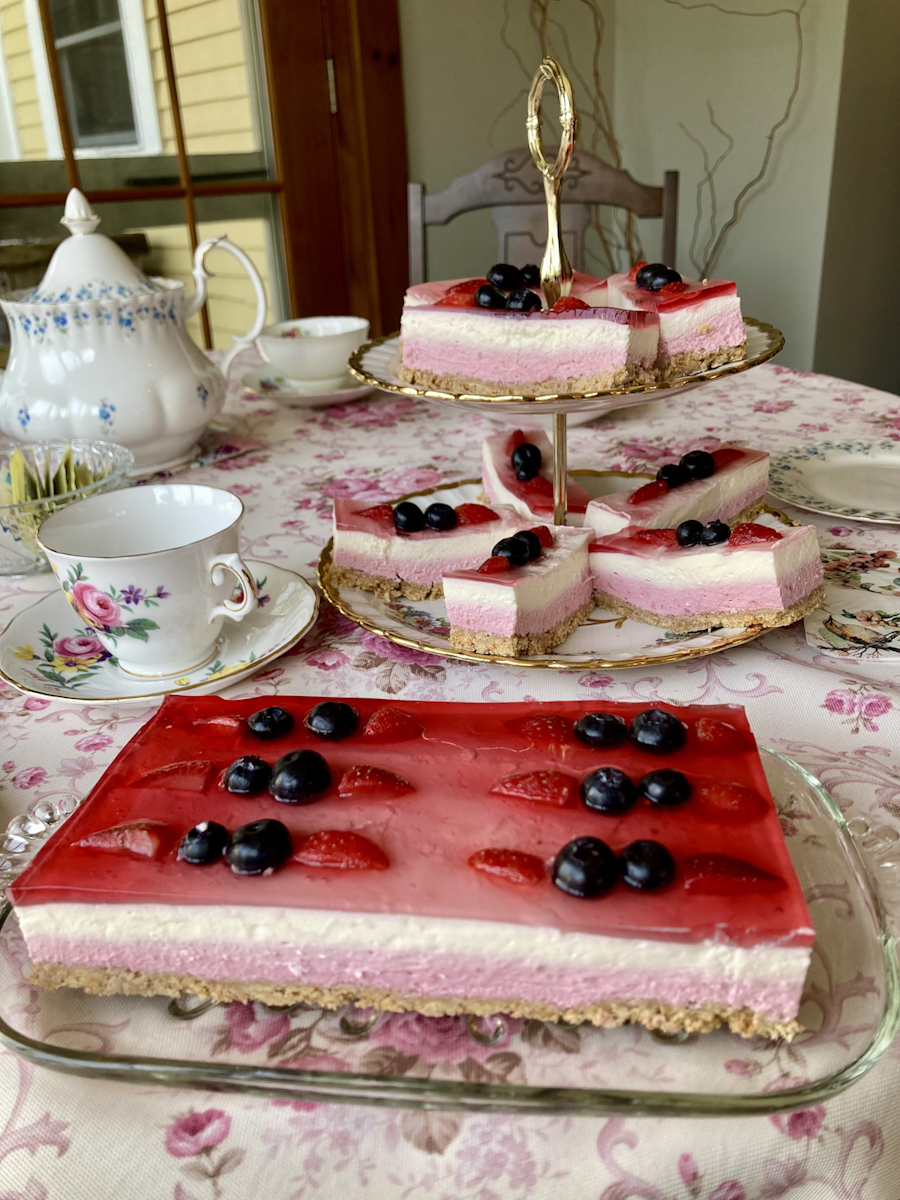 Berry cheesecake served on vintage china